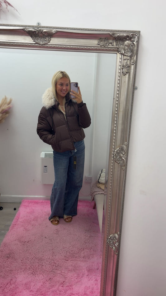 Brown puffer jacket with cream fur hood